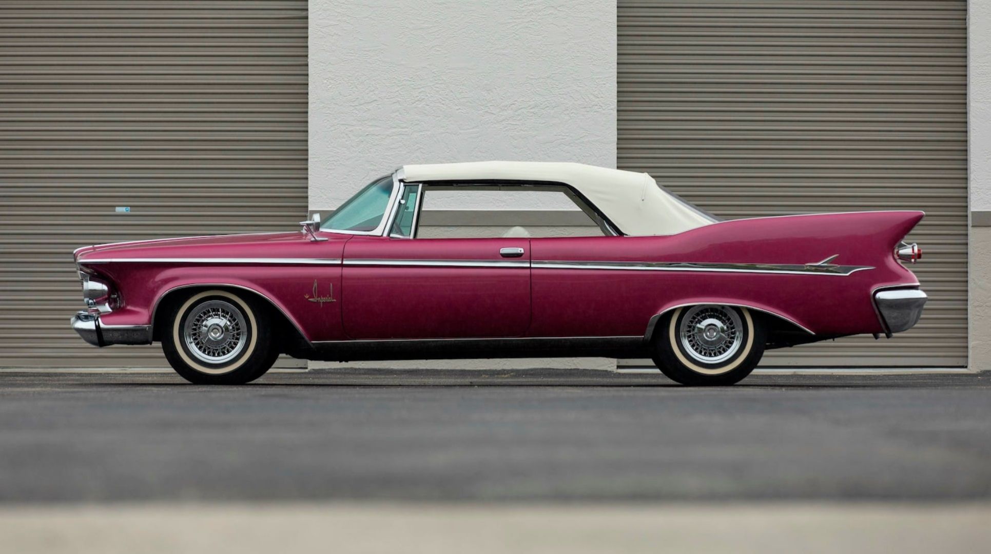 A side look at the 1961 Chrysler Imperial Crown Convertible.