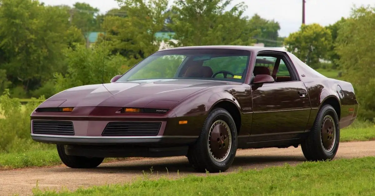 Burgundy Pontiac Firebird Trans Am Parked Outisde