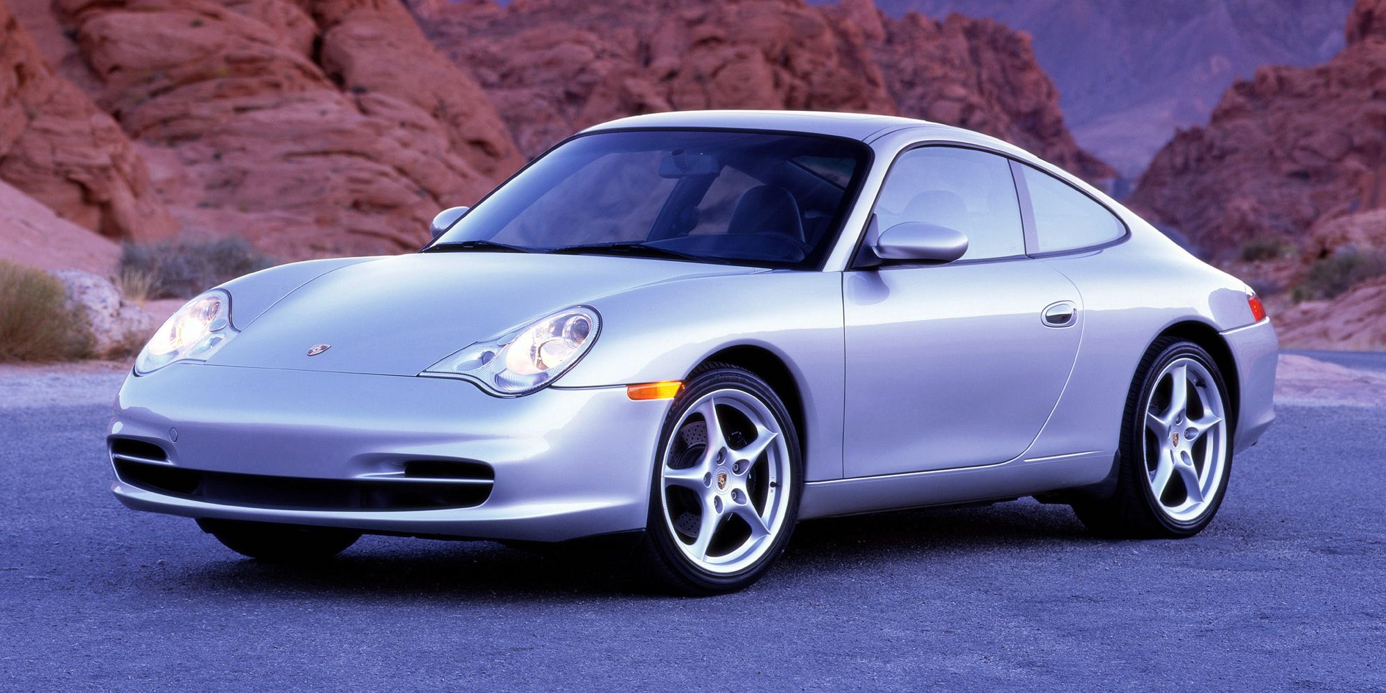 Front 3/4 view of a silver 996 911 Carrera