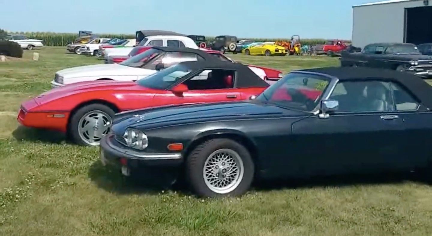 Abandoned Classic Cars at museum field, side view of group of cars