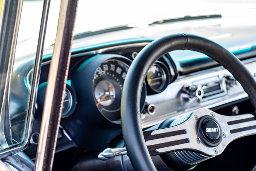 black and silver mercedes benz steering wheel